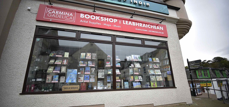 Our book shop in Portree on the Isle of Skye sells a variety of books postcards stamps music electronic goods art supplies and maps